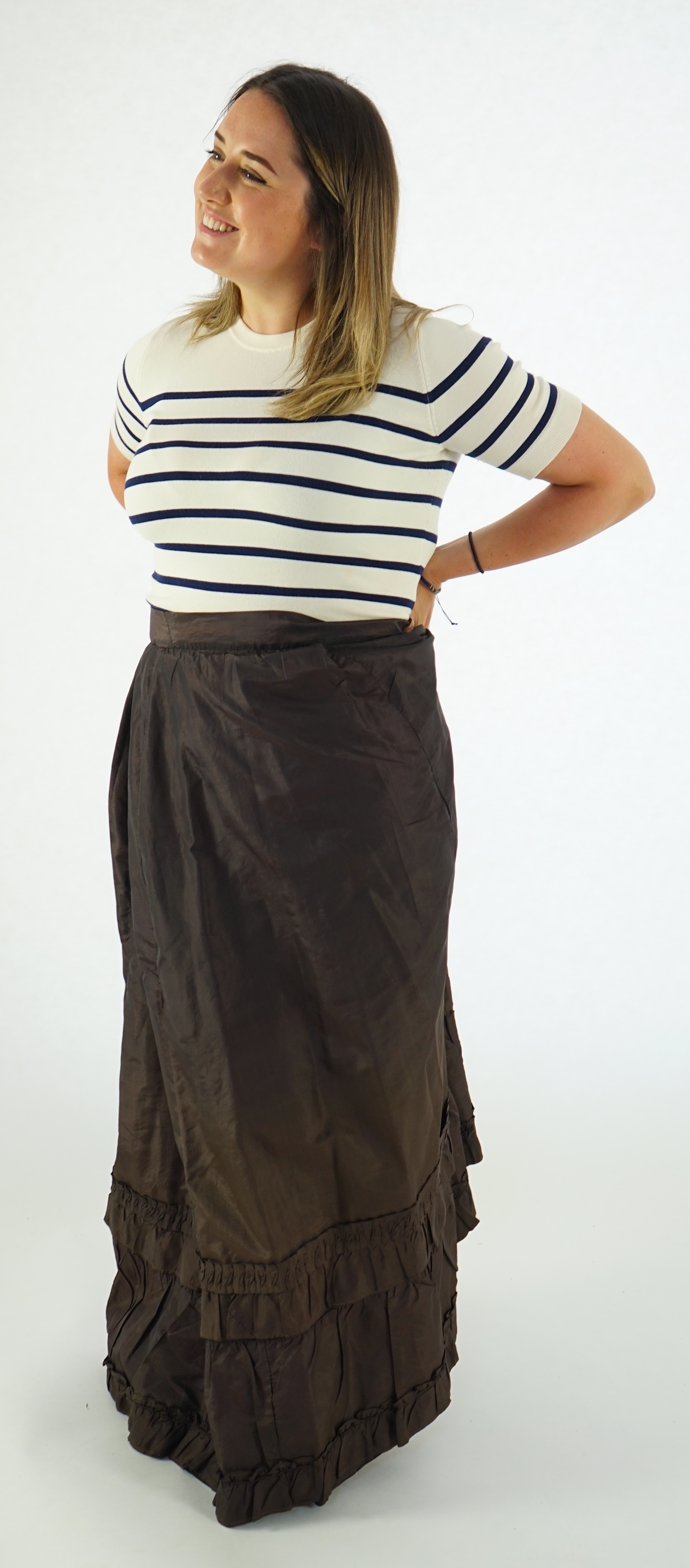 A lady's dark brown (original 19th century) skirt with decorative work.